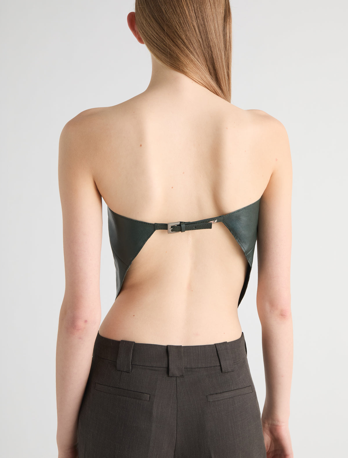 Alba top triangle shaped leather top scarf like silhouette metal buckle closure green