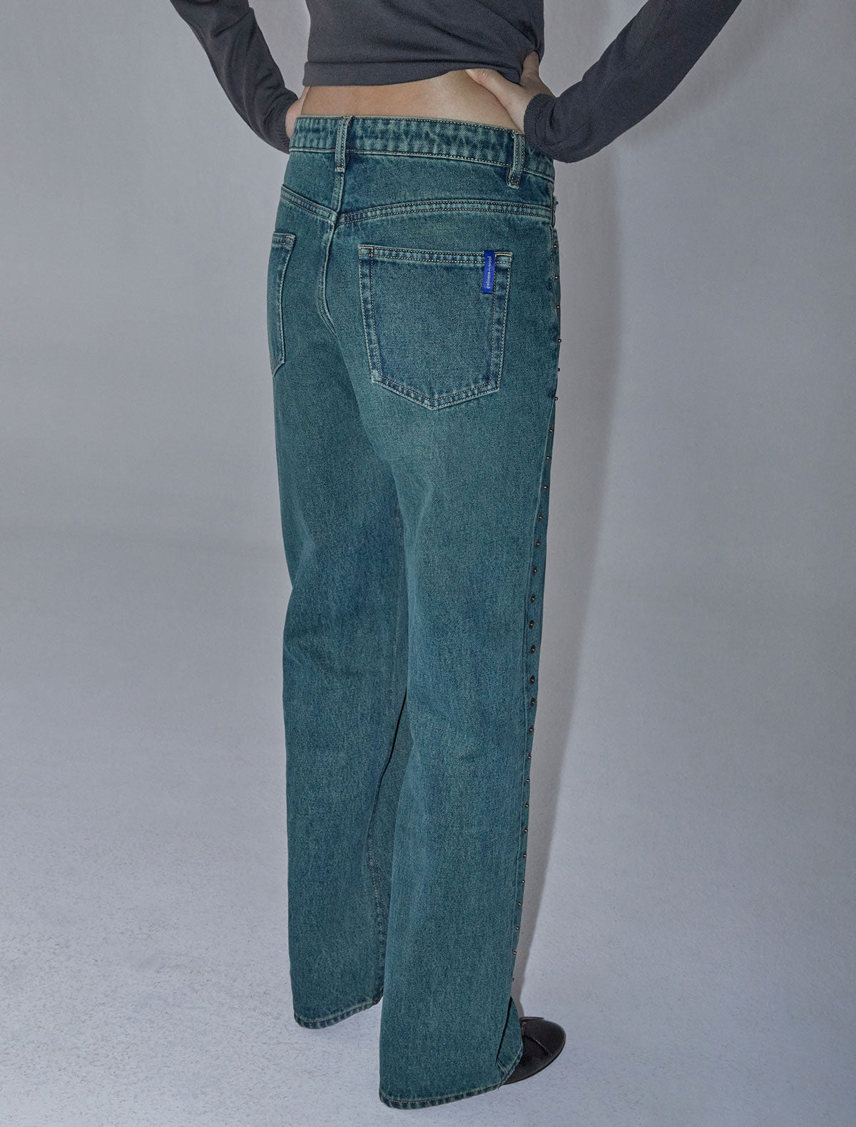 Crowd low waist pants metal detail seams denim