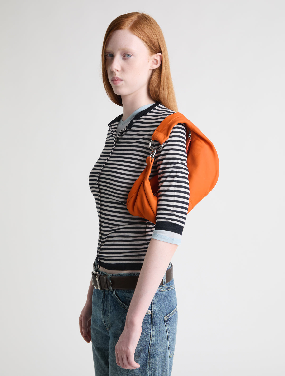 Mini dry elongated mini wrap around hobo style shoulder bag orange