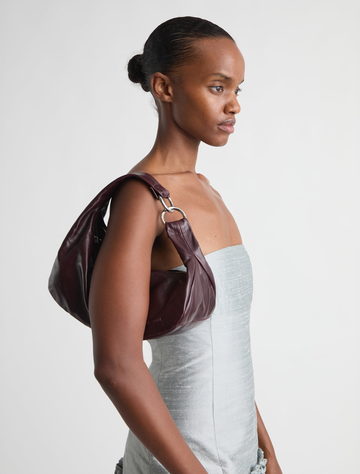 Mini dry elongated mini wrap around hobo style shoulder bag wine