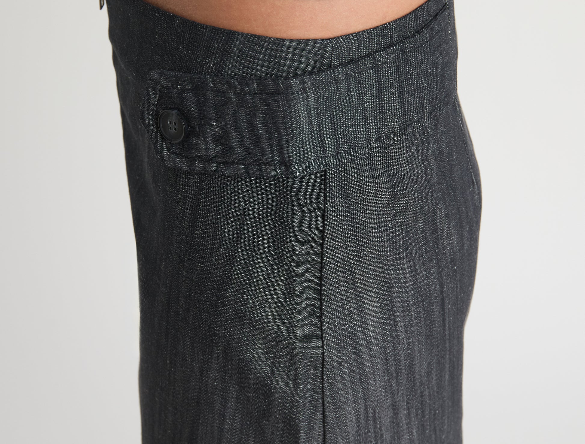 Deuna denim mini skirt side straps front zip closure