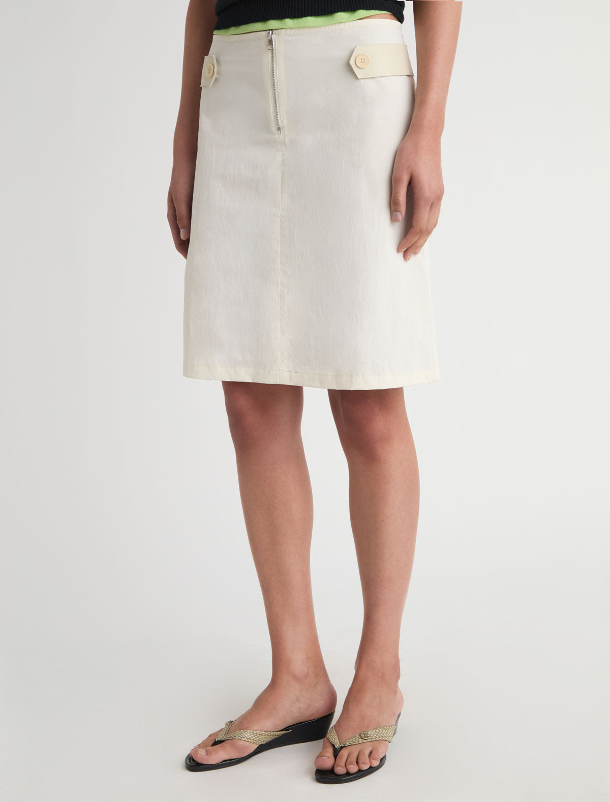Deuna nylon midi skirt leather panels sides front zipper closure white