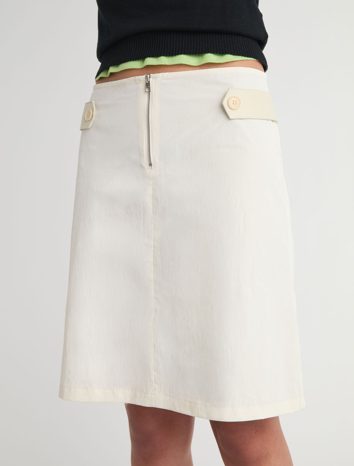Deuna nylon midi skirt leather panels sides front zipper closure white