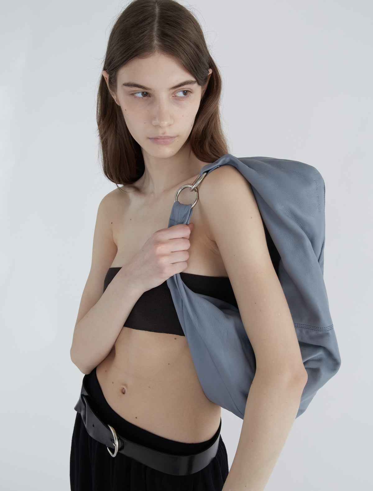 Dry elongated wrap around hobo style shoulder bag lightgreyishblue
