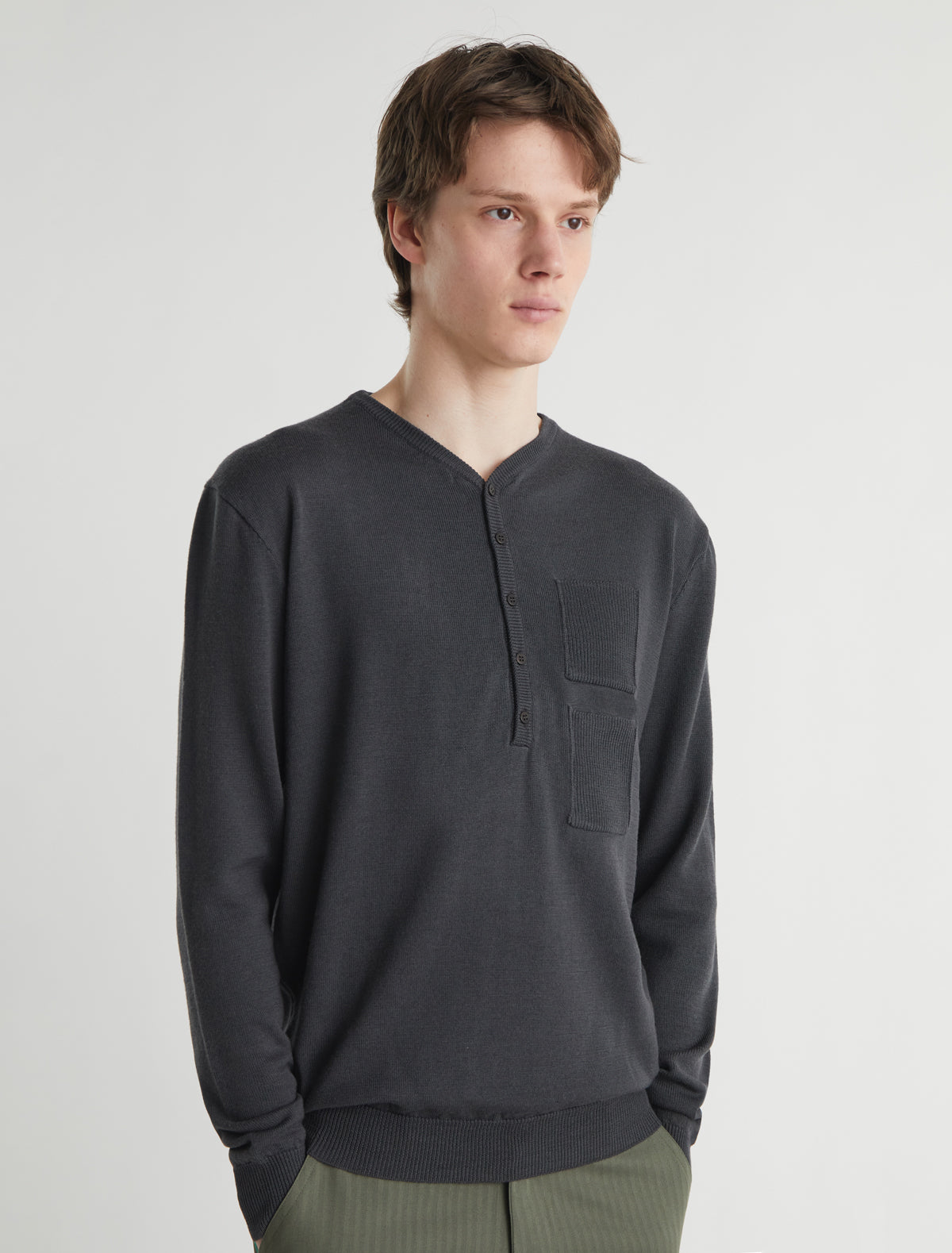 Mario v neck wool sweater front placket pocket detailing