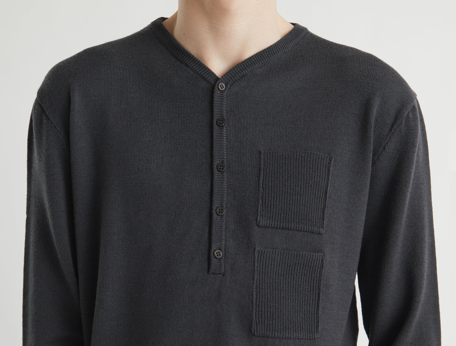 Mario v neck wool sweater front placket pocket detailing