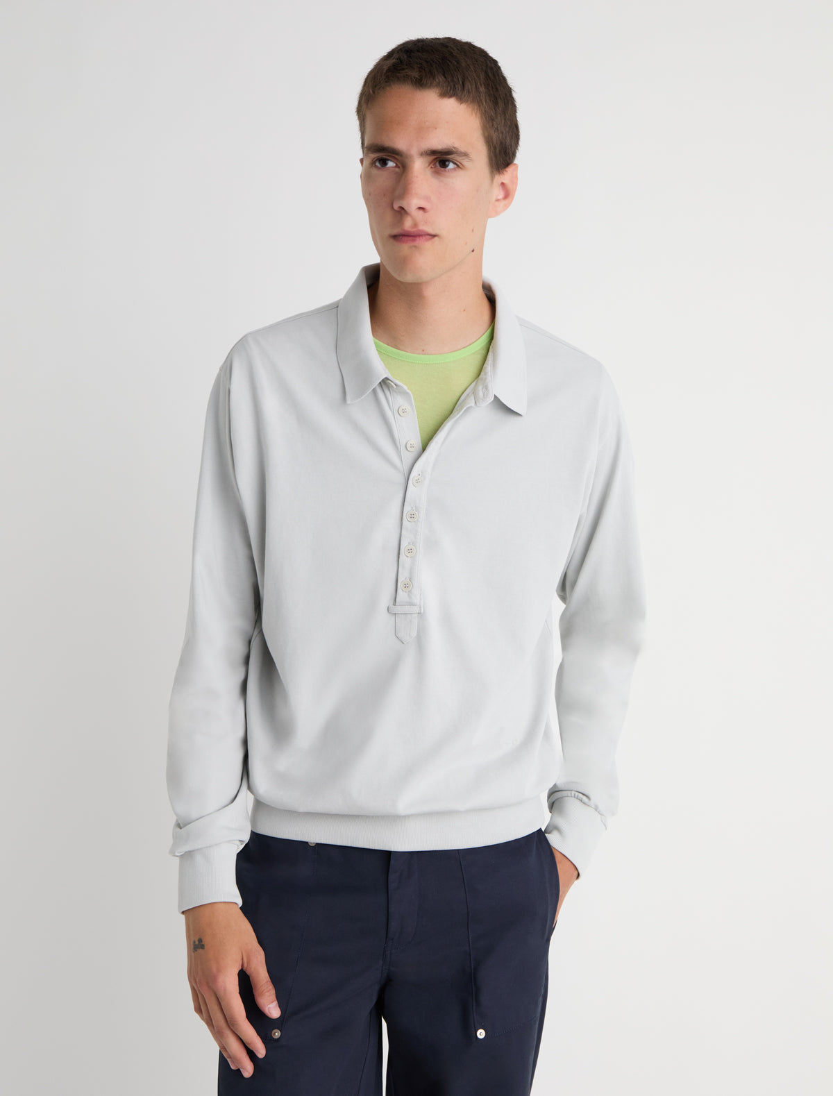 Romi long sleeve polo shirt extended placket ribbed cuffs hem