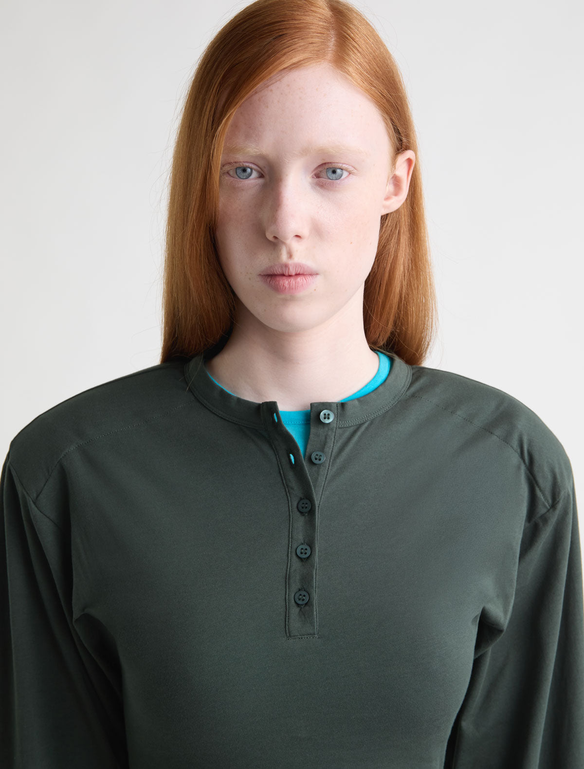 Ryno long sleeve top henley neckline shoulder pads khaki