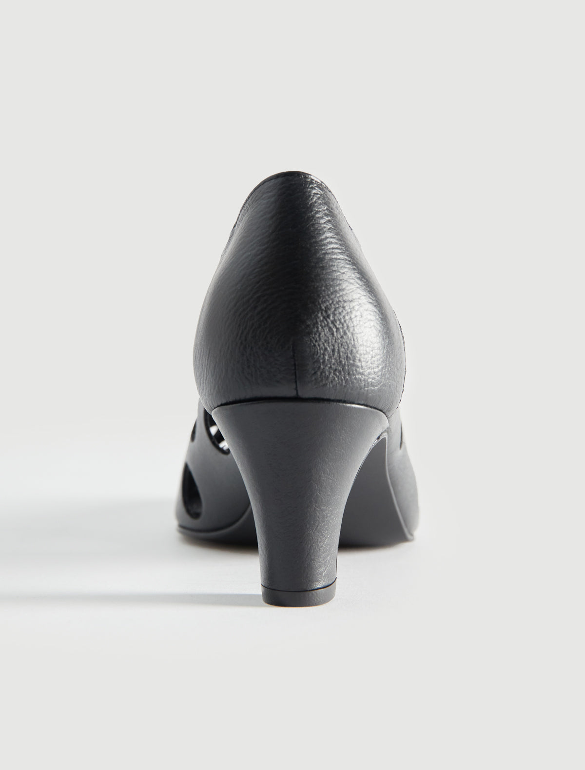 Uma dot pump perforated leather polka dot pattern black