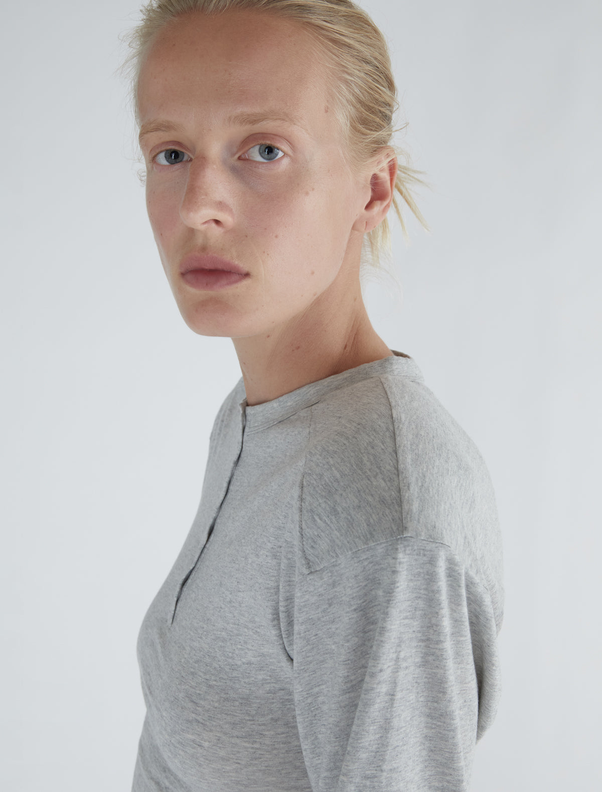 Ryno long sleeved top henley neckline shoulder pads grey