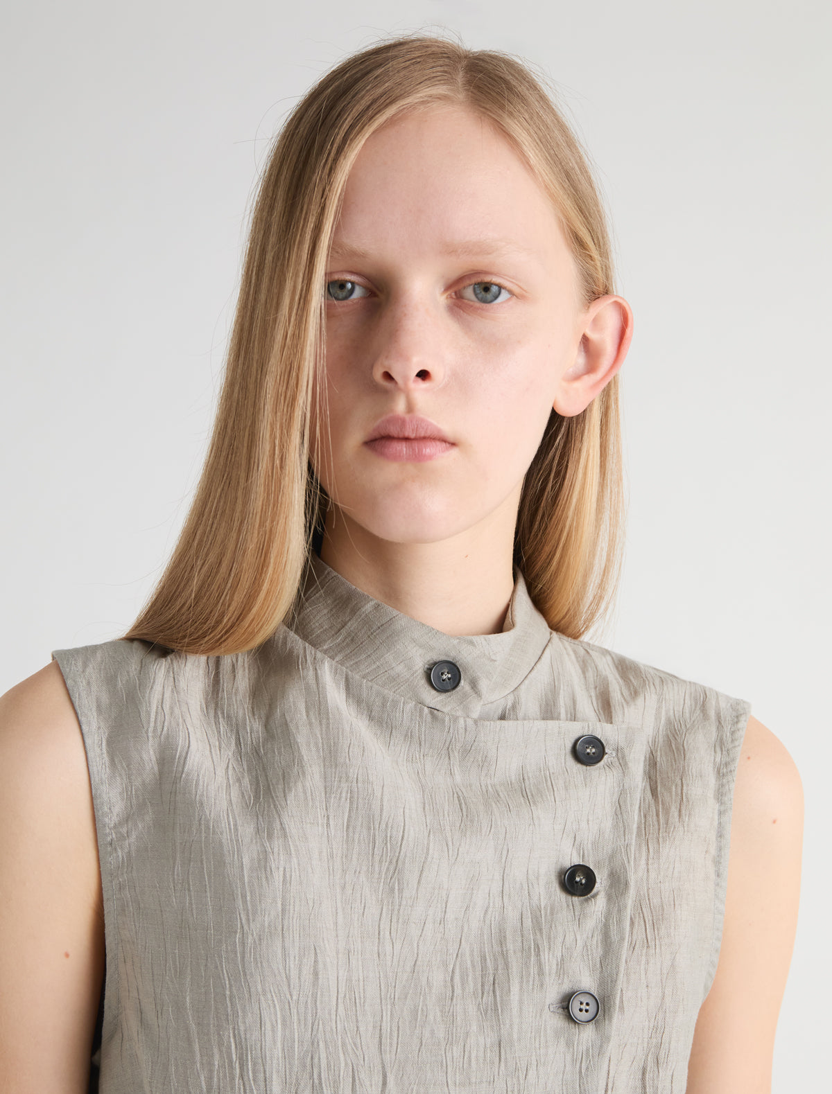 Sara high neck top wrap front button closure grey