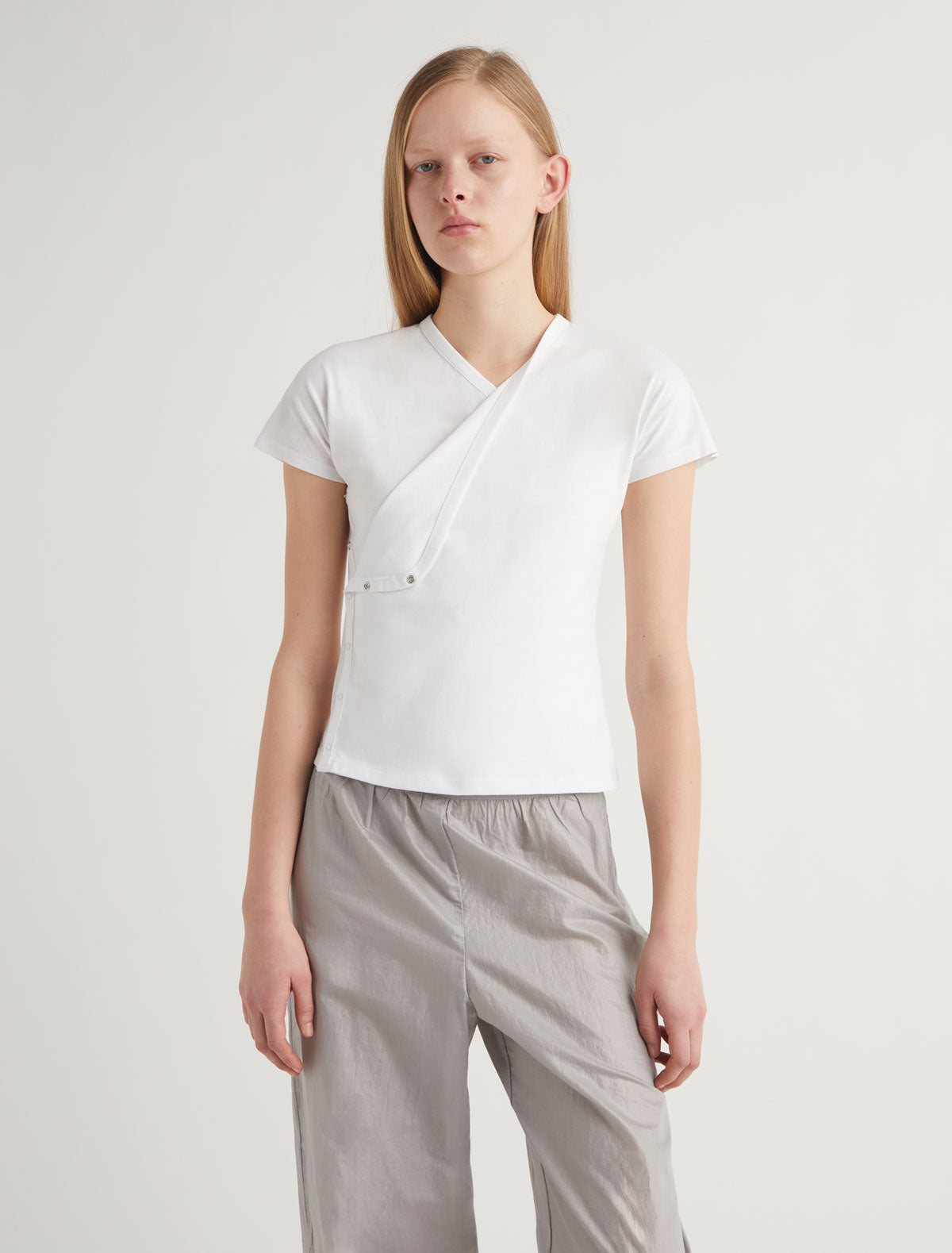 Olimpia crossed ranglan top snap closures embroidered detail white
