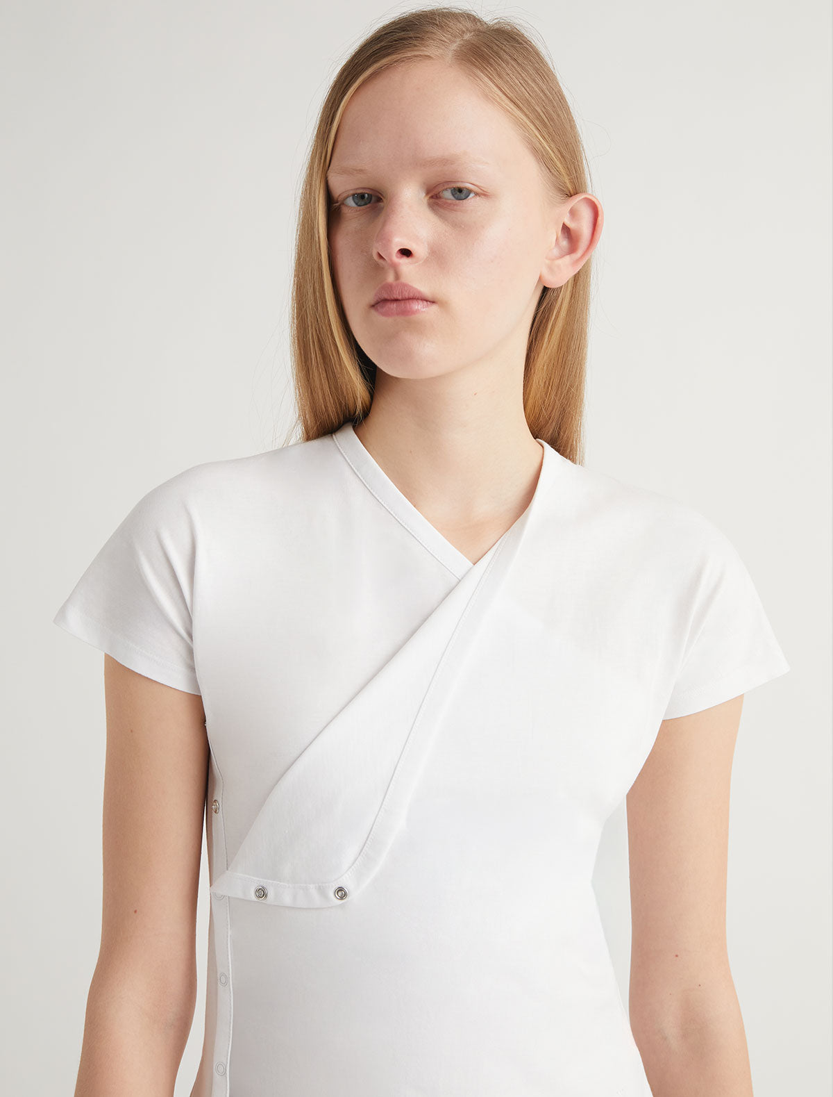 Olimpia crossed ranglan top snap closures embroidered detail white