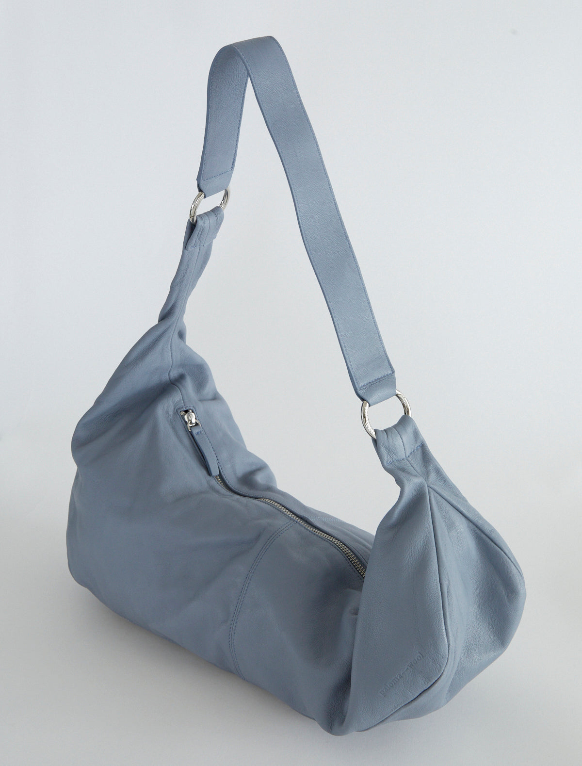 Dry elongated wrap around hobo style shoulder bag lightgreyishblue