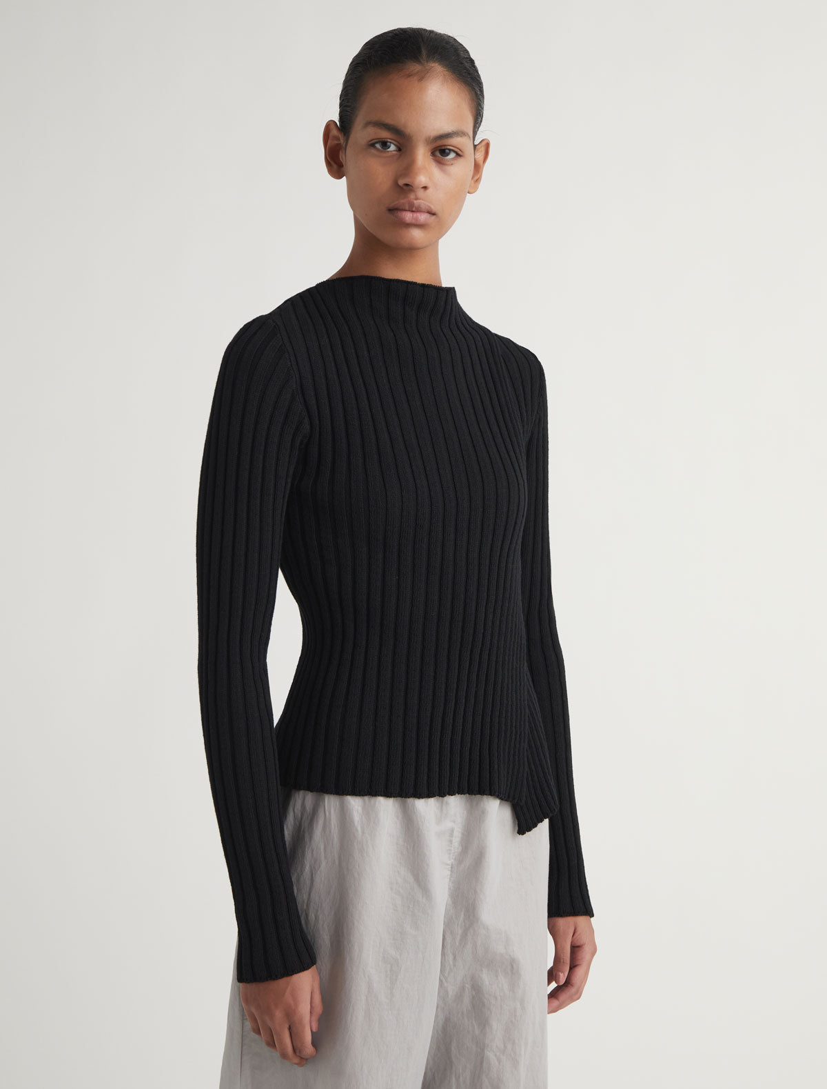 Esmolar long sleeved ribbed knit top overlaping neckline