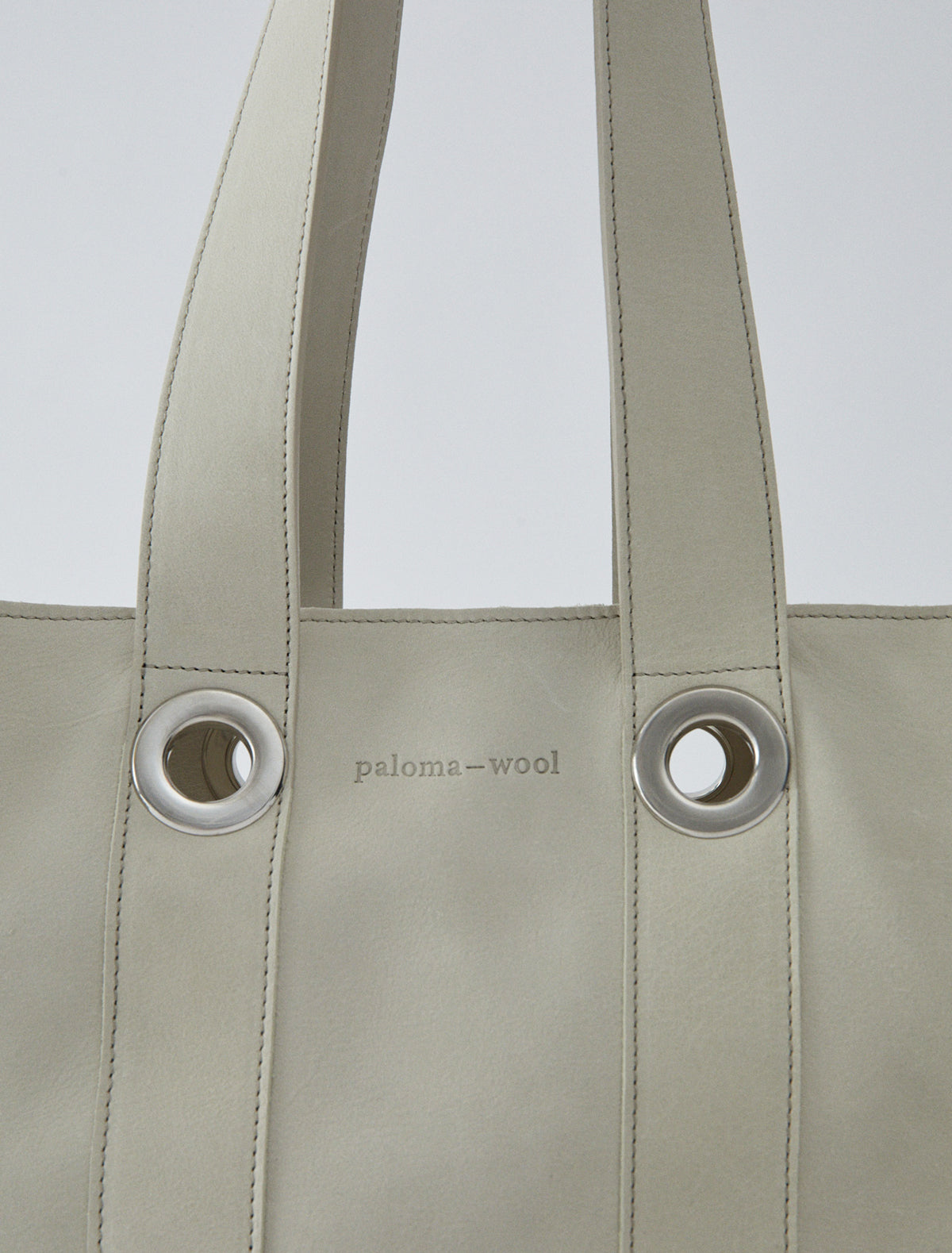 Milagros square shaped bucket bag eyelets detail ecru