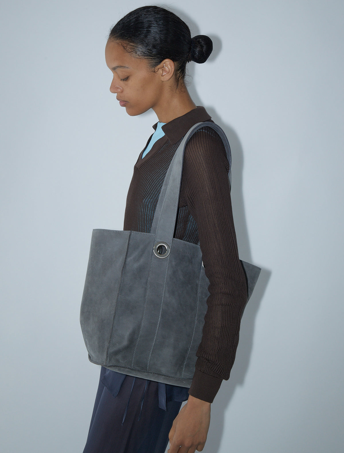 Milagros square shaped bucket bag eyelets detail grey