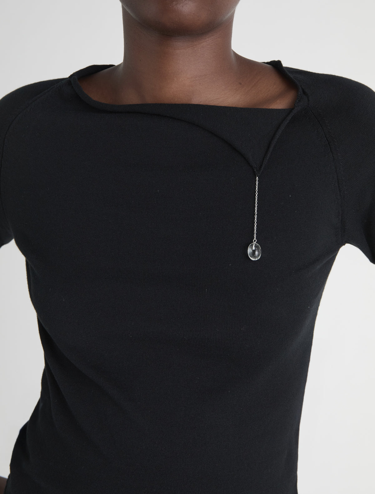 Cain short sleeve knit top handmade glass piece detail hanging chain