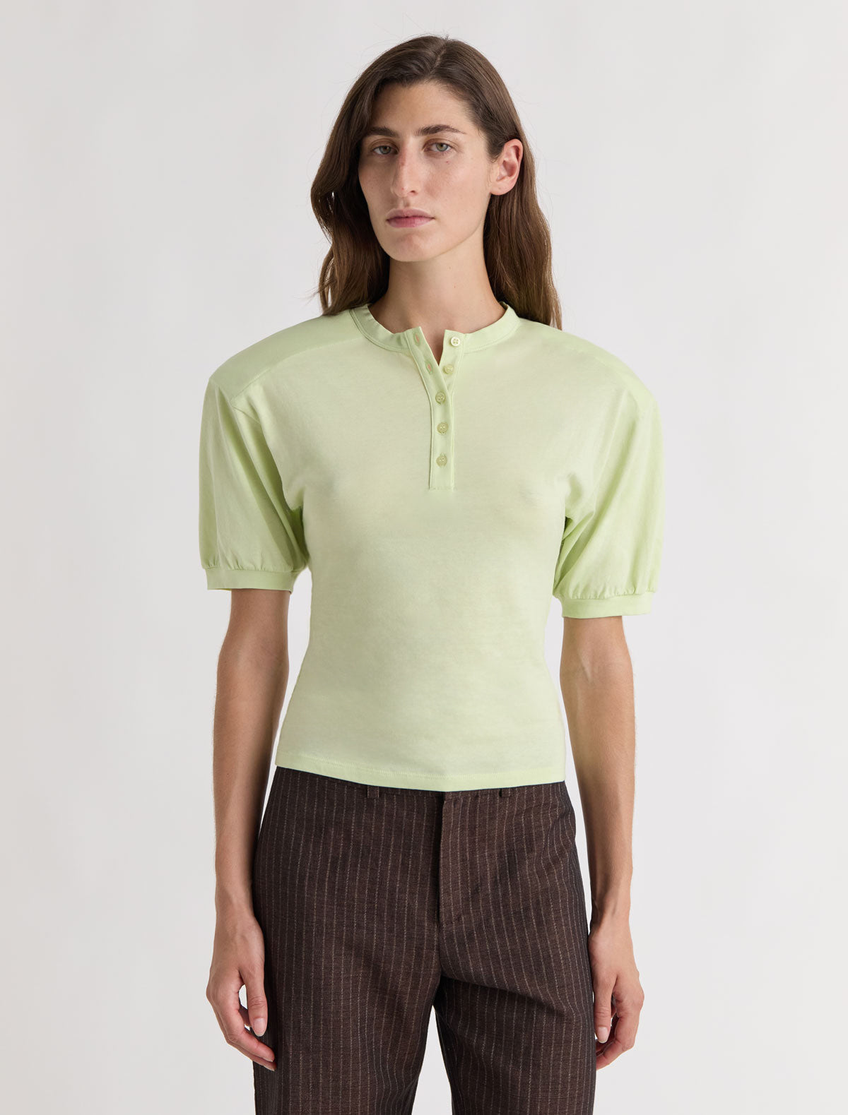 Renfo short sleeved top henley neckline raglan sleeves removable shoulder pads fluor